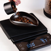 Weegschaal bovenaanzicht – digitale koffieschaaltje met timerknop