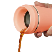 Flow 360° Beker peach zijaanzicht – lekvrije koffiebeker perzikkleur